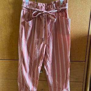 Pink and white paper bag pants